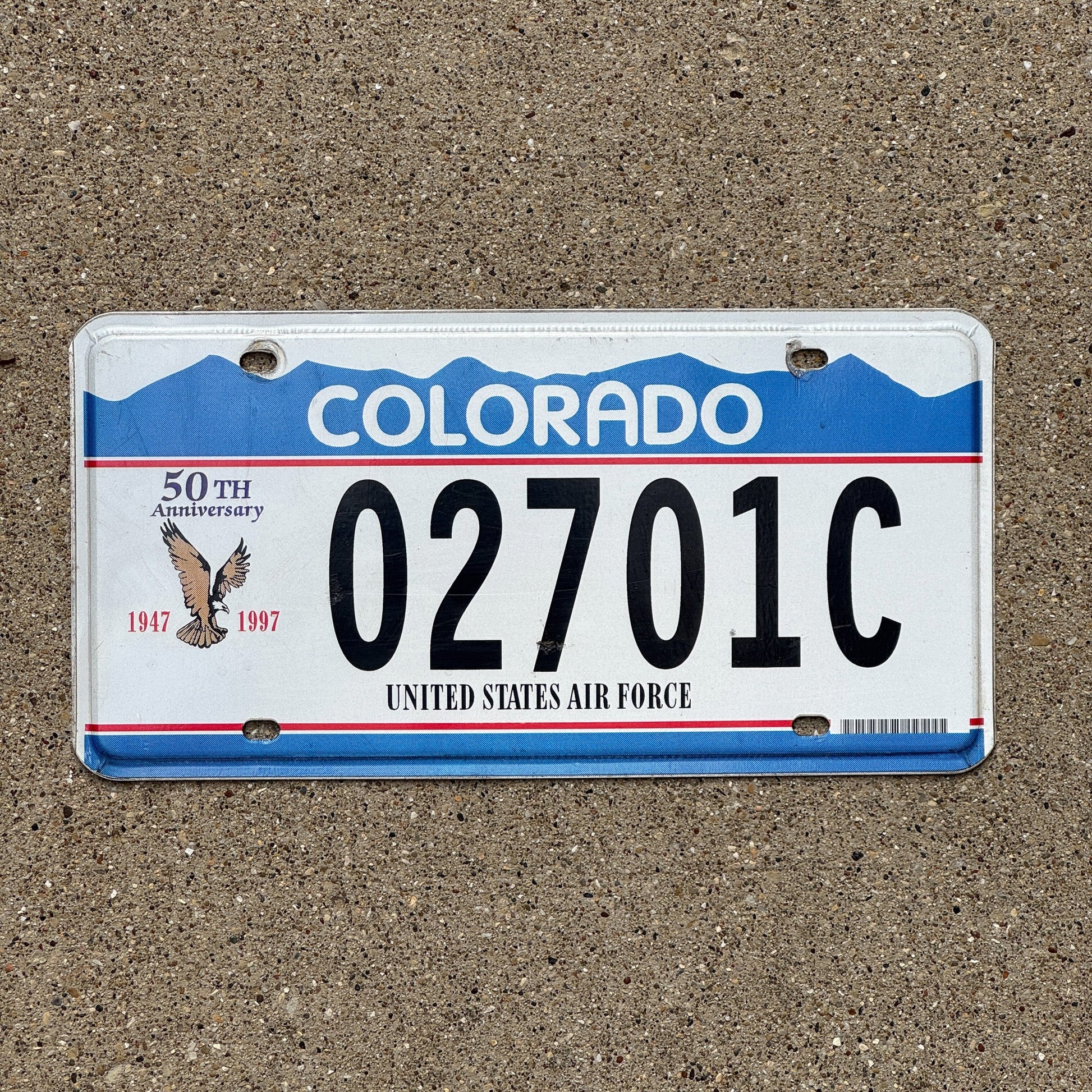 Photo of a 1997 Colorado Military License Plate Auto Tag Garage Decor Vintage US Air Force 50th Anniversary 02701 C