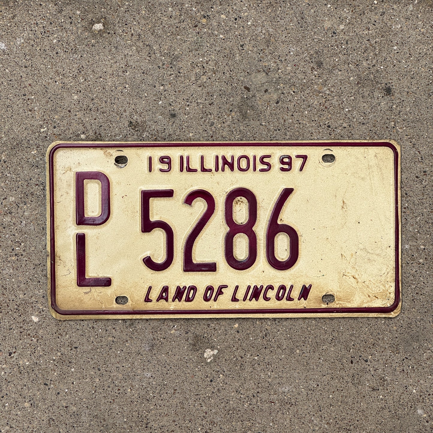 Photo of a 1997 Illinois Dealer License Plate Auto Tag 2 Vintage Garage 5286 with original patina