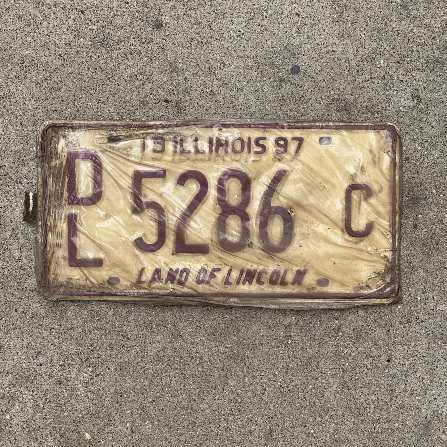 Photo of a 1997 Illinois Dealer License Plate Pair Auto Tag Garage Decor Vintage New Old Stock 5286 C with original patina