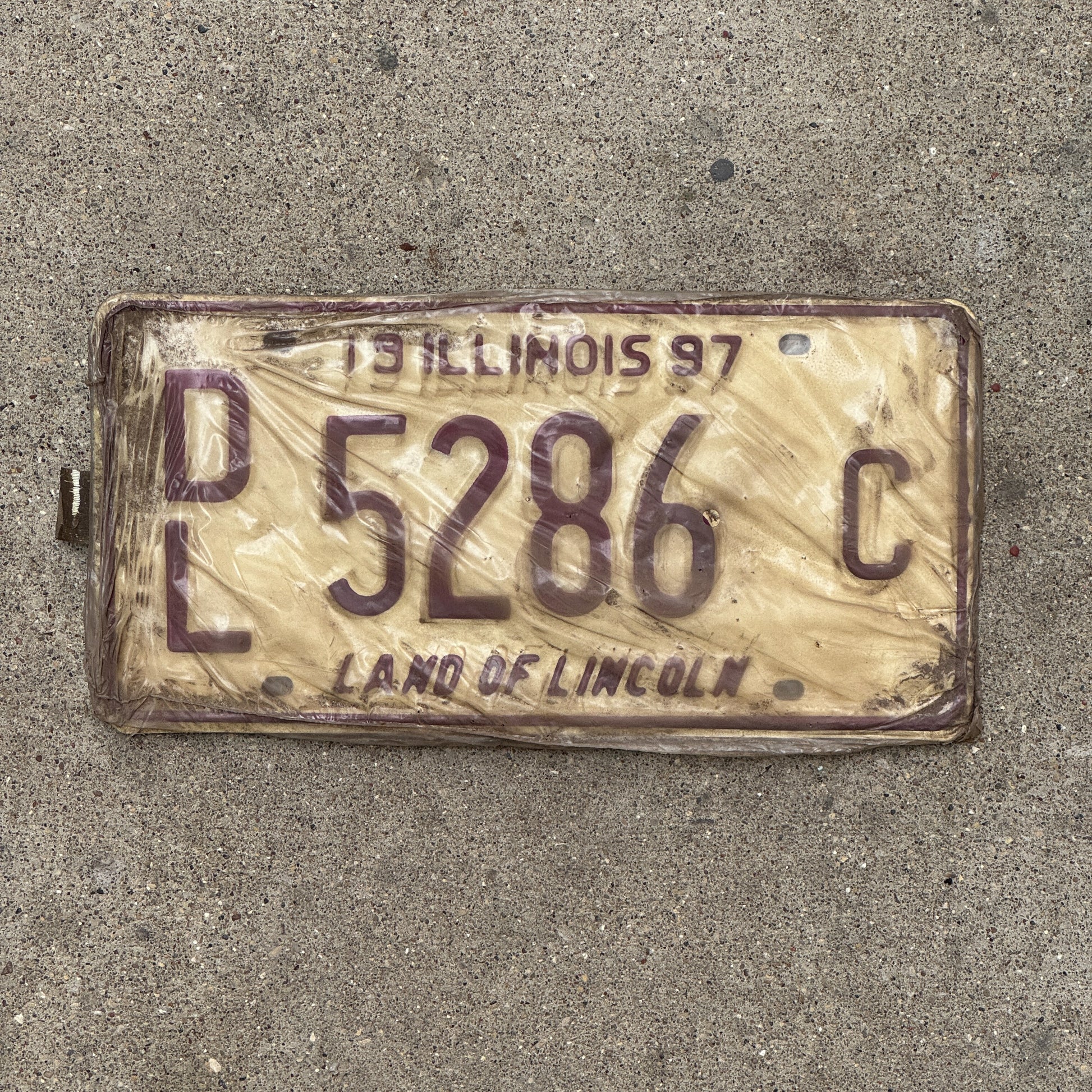 Photo of a 1997 Illinois Dealer License Plate Pair Auto Tag Garage Decor Vintage New Old Stock 5286 C with original patina