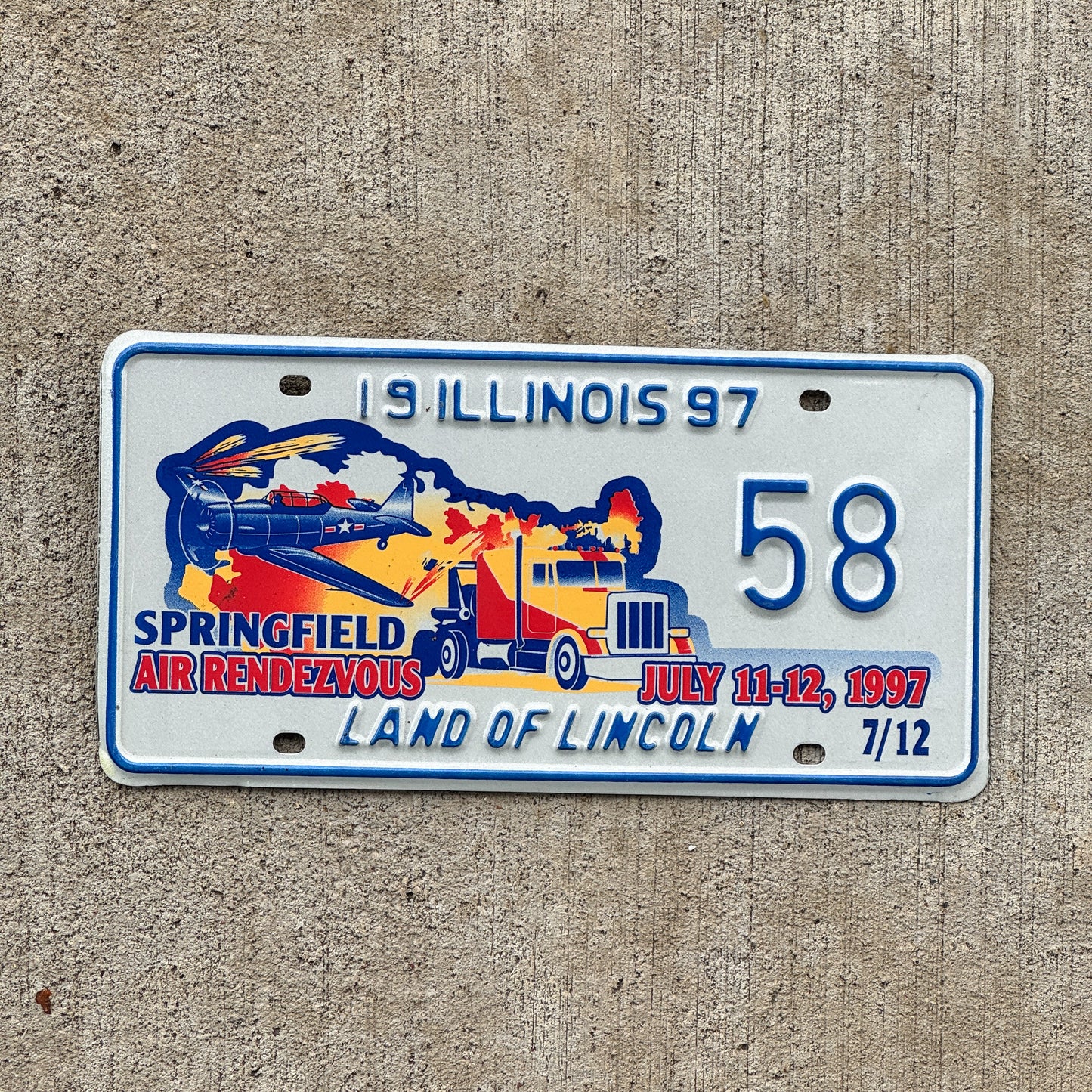Photo of a 1997 Illinois Event License Plate Auto Tag Garage Decor Vintage Springfield Air Rendezvous 58 with original patina