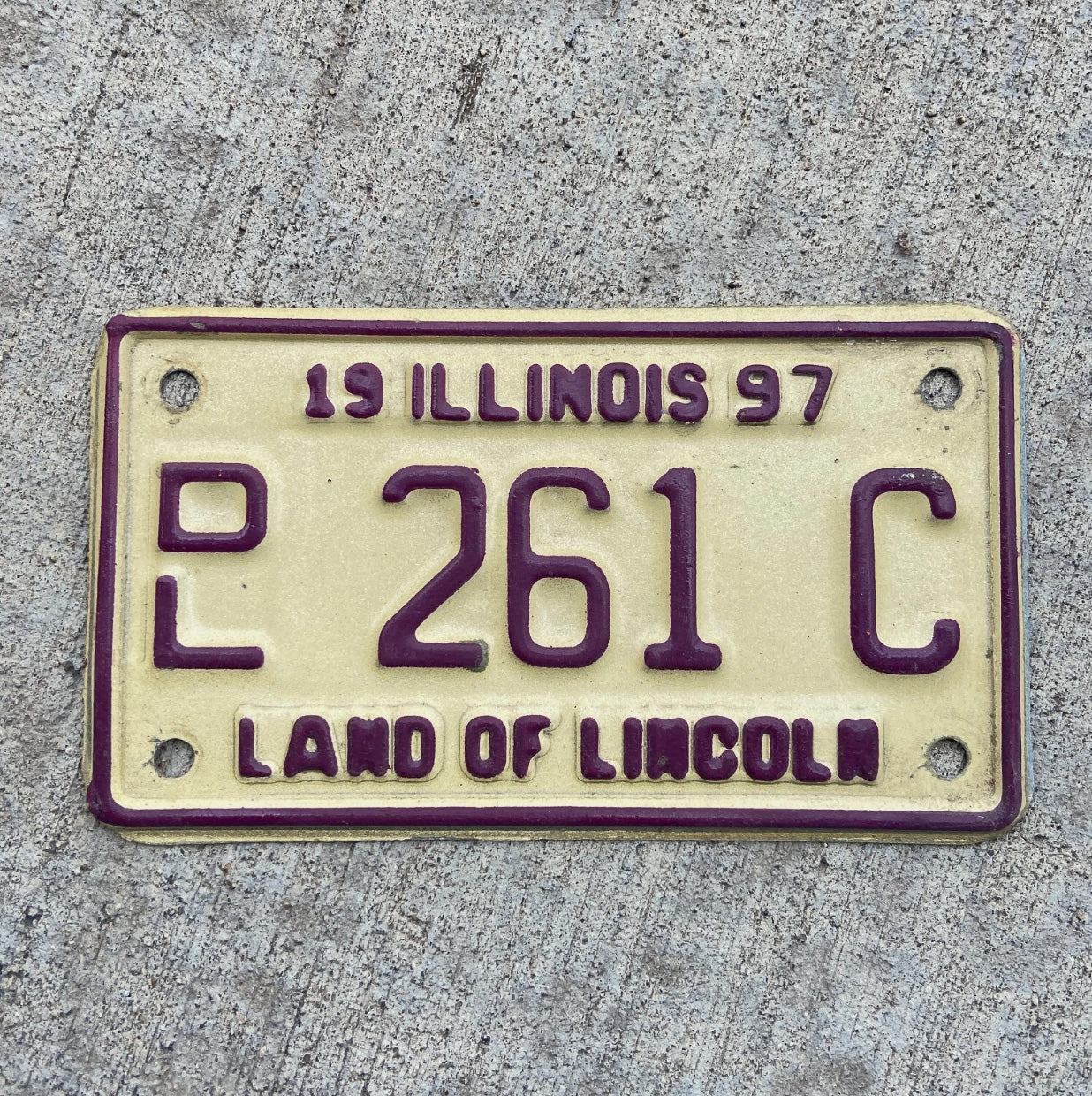 Photo of a 1997 Illinois Motorcycle Dealer License Plate Auto Tag Garage Decor Vintage 261 C with original patina