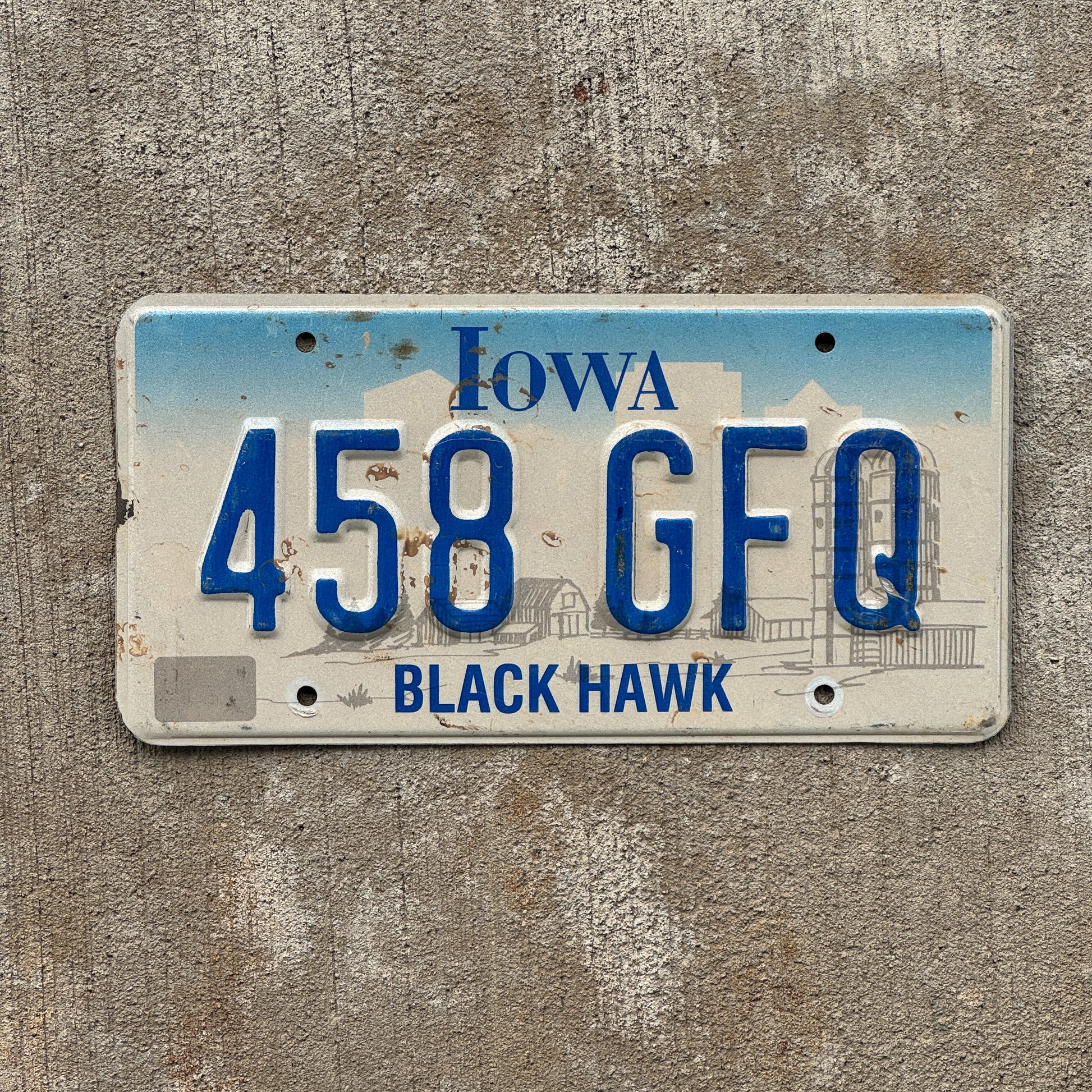 Photo of a 1997 Iowa License Plate Auto Tag Garage Decor Vintage 458 GFQ with original patina