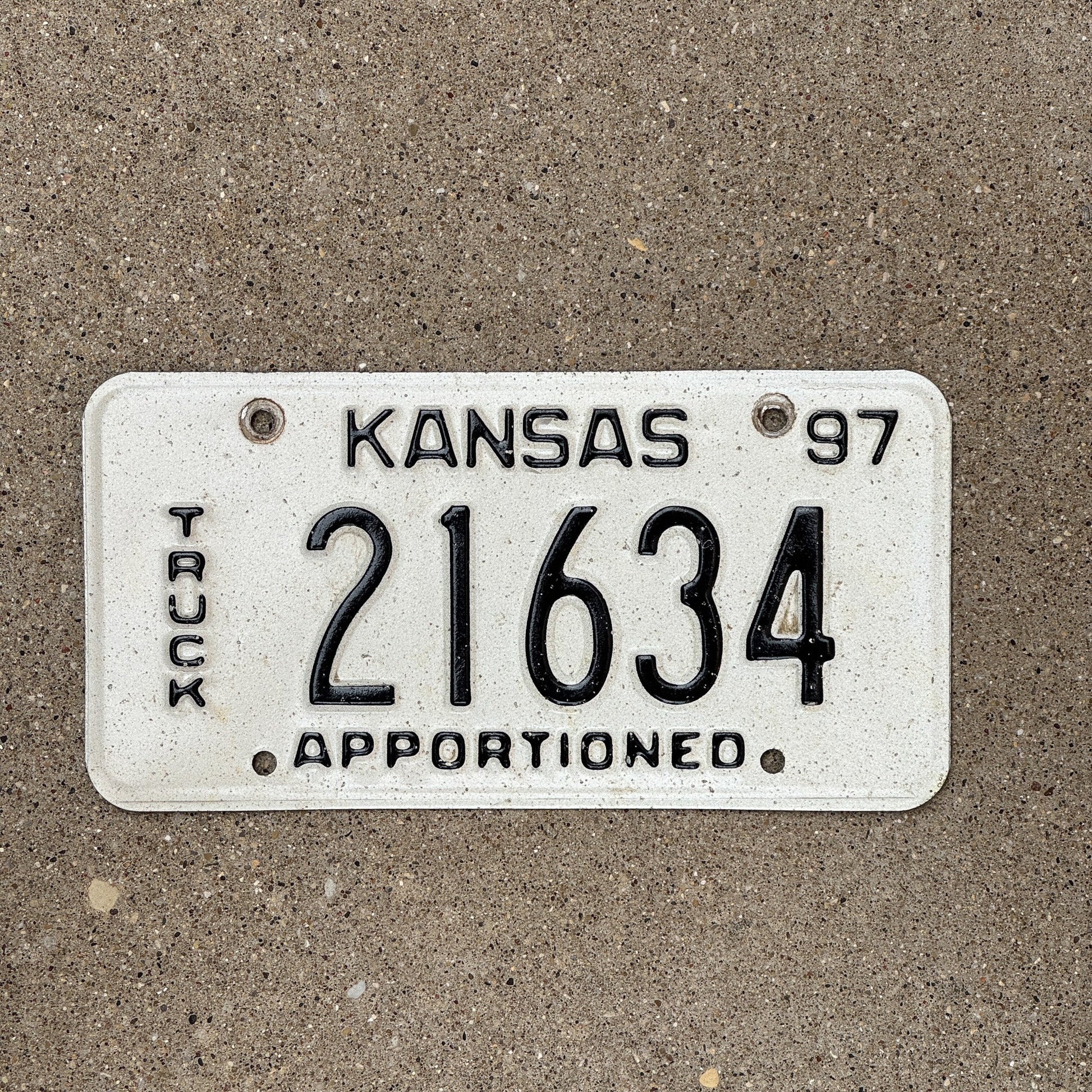 Photo of a 1997 Kansas Apportioned License Plate Auto Tag Garage Decor Vintage 21634