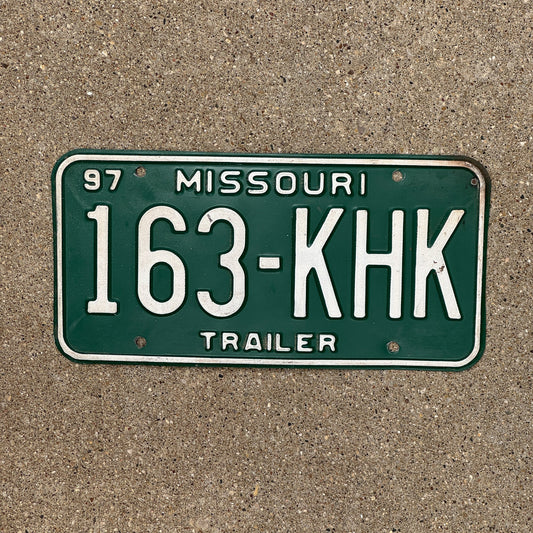Photo of a 1997 Missouri Trailer License Plate Auto Tag Garage Decor Vintage 163 KHK