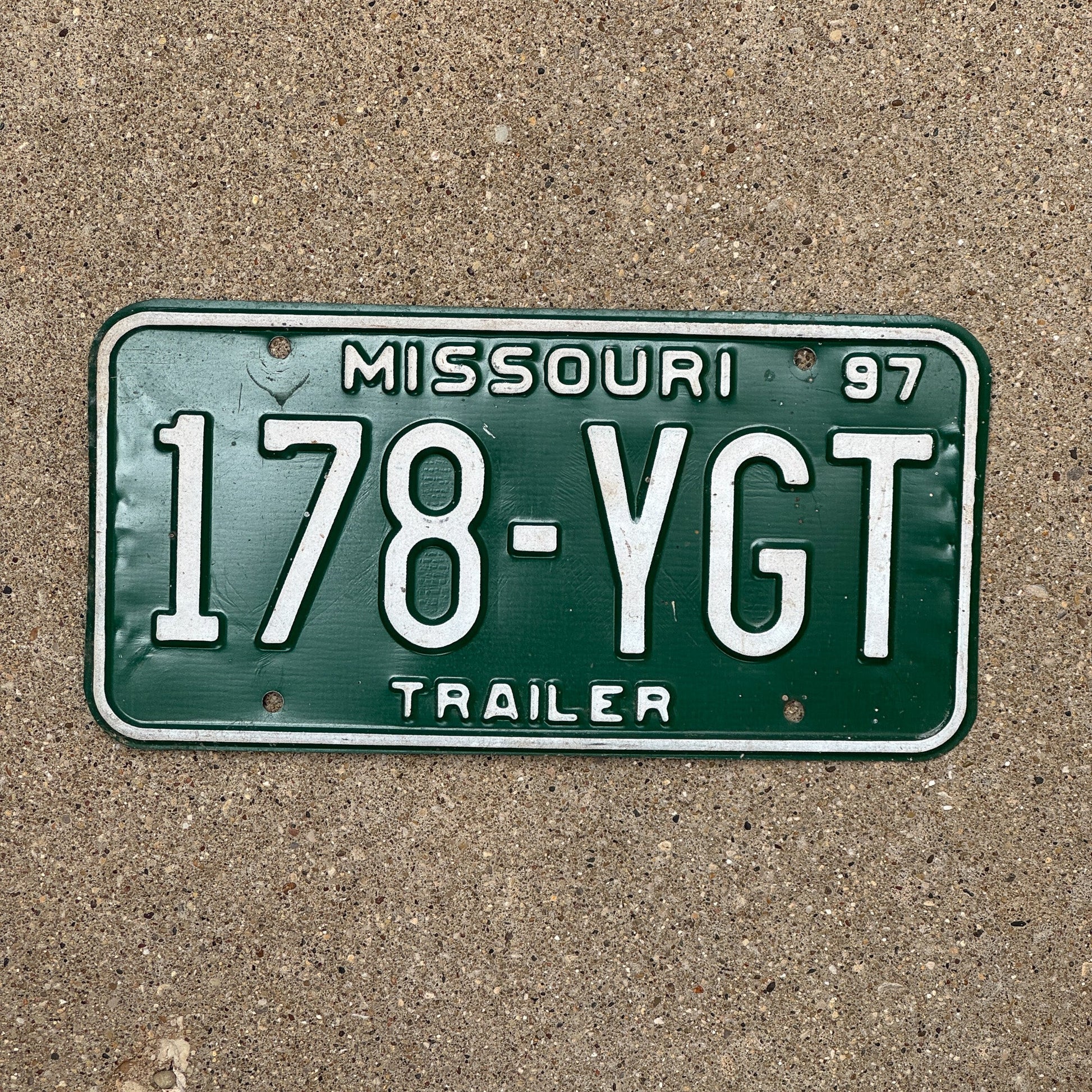 Photo of a 1997 Missouri Trailer License Plate Auto Tag Garage Decor Vintage 178 YGT