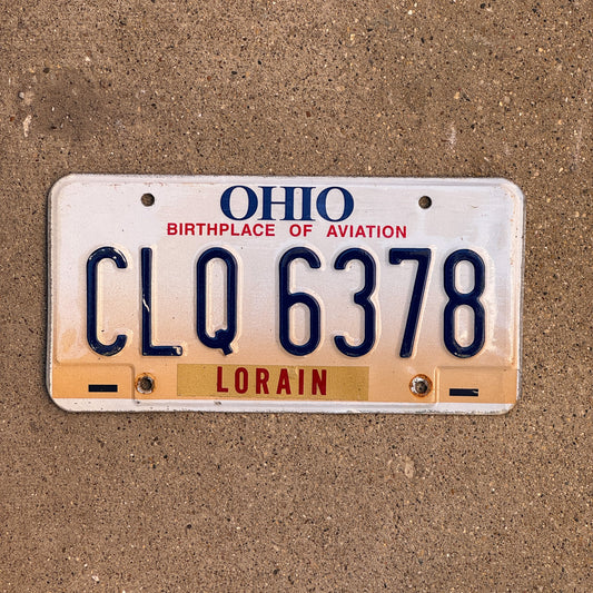 Photo of a 1997 Ohio License Plate Auto Tag 1 Vintage Garage CLQ 6378 with original patina