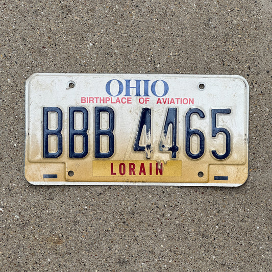Photo of a 1997 Ohio License Plate Auto Tag 2 Vintage Garage Repeat Repeating BBB 4465 with original patina