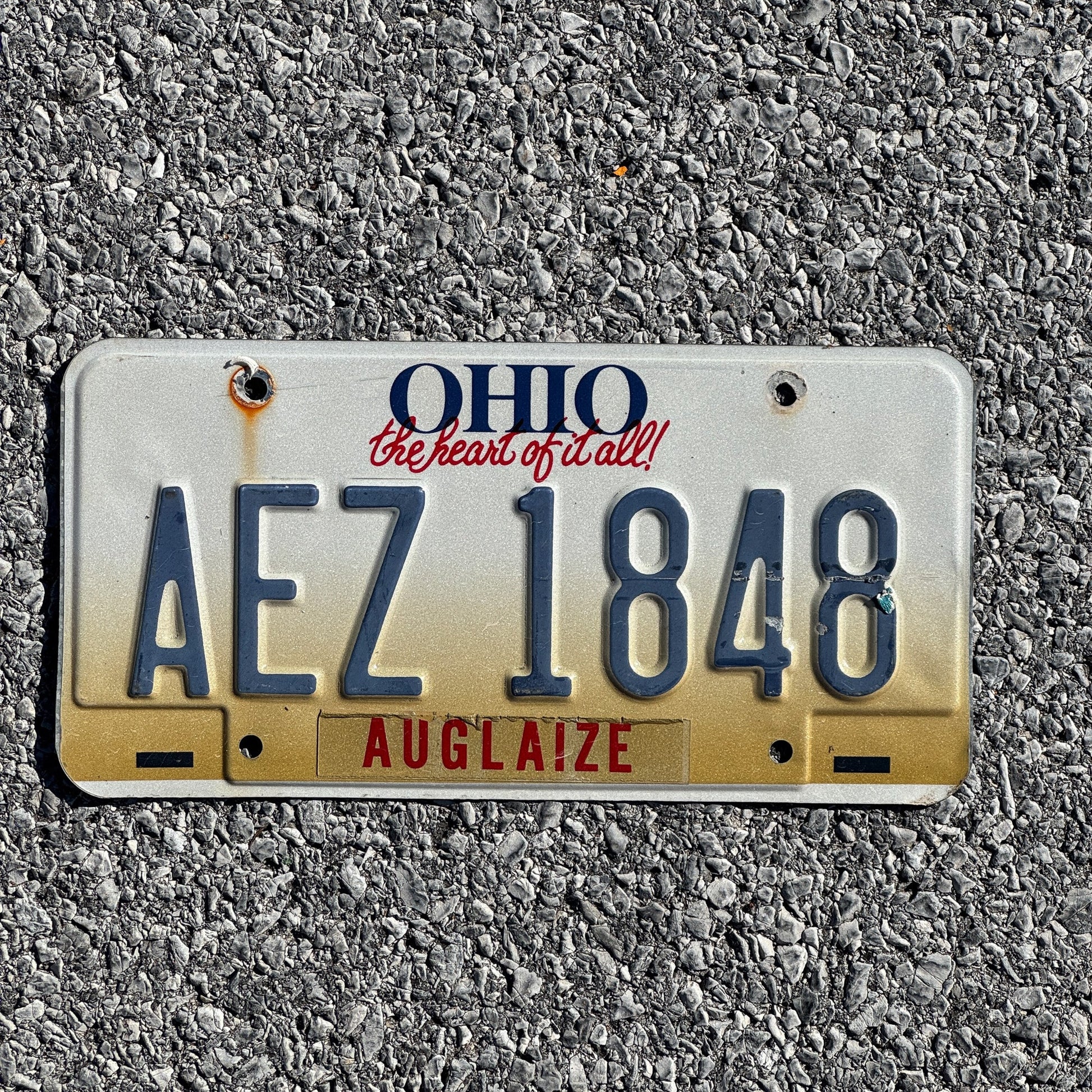 Photo of a 1997 Ohio License Plate Auto Tag Garage Decor Vintage AEZ 1848