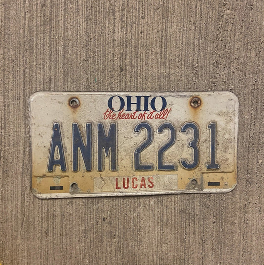 Photo of a 1997 Ohio License Plate Auto Tag Garage Decor Vintage Lucas County ANM 2231