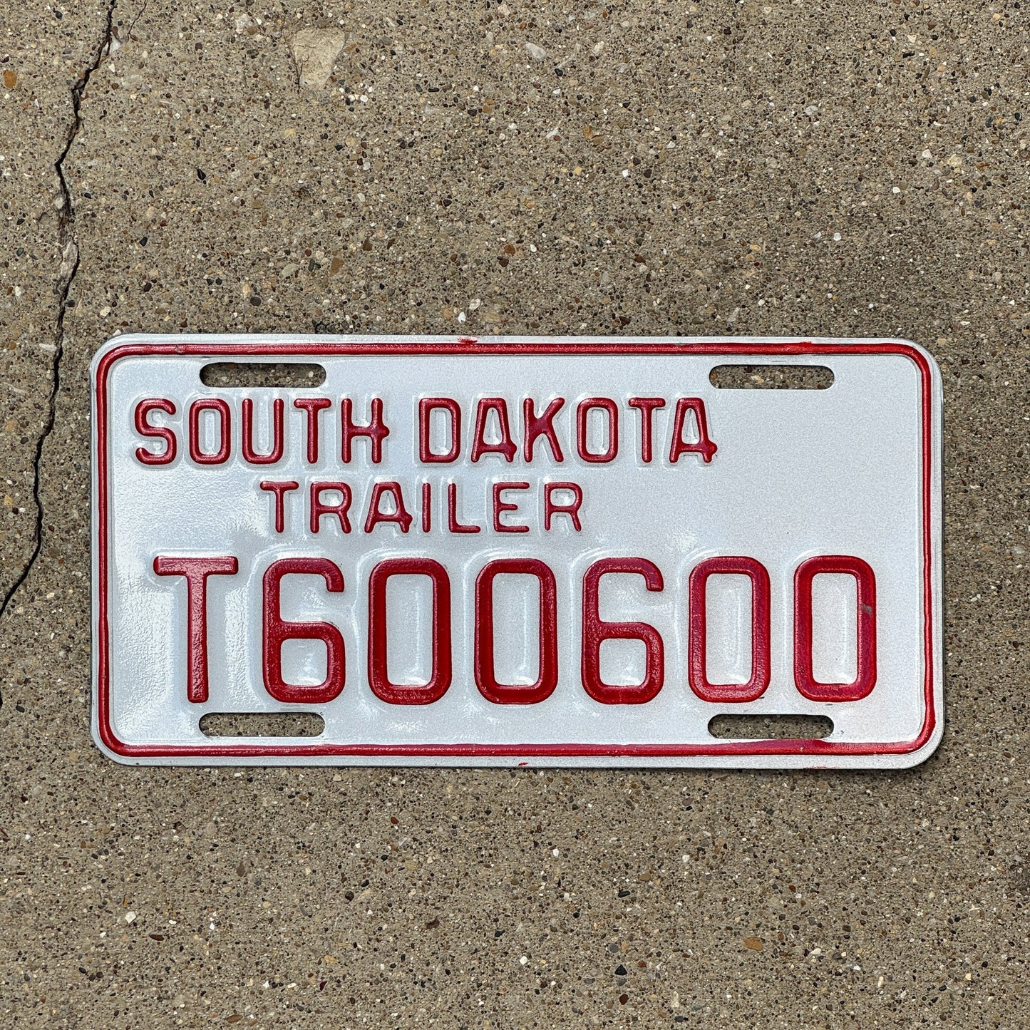 Photo of a 1997 South Dakota Trailer License Plate Auto Tag Garage Decor Vintage Repeat Repeating T 600 600