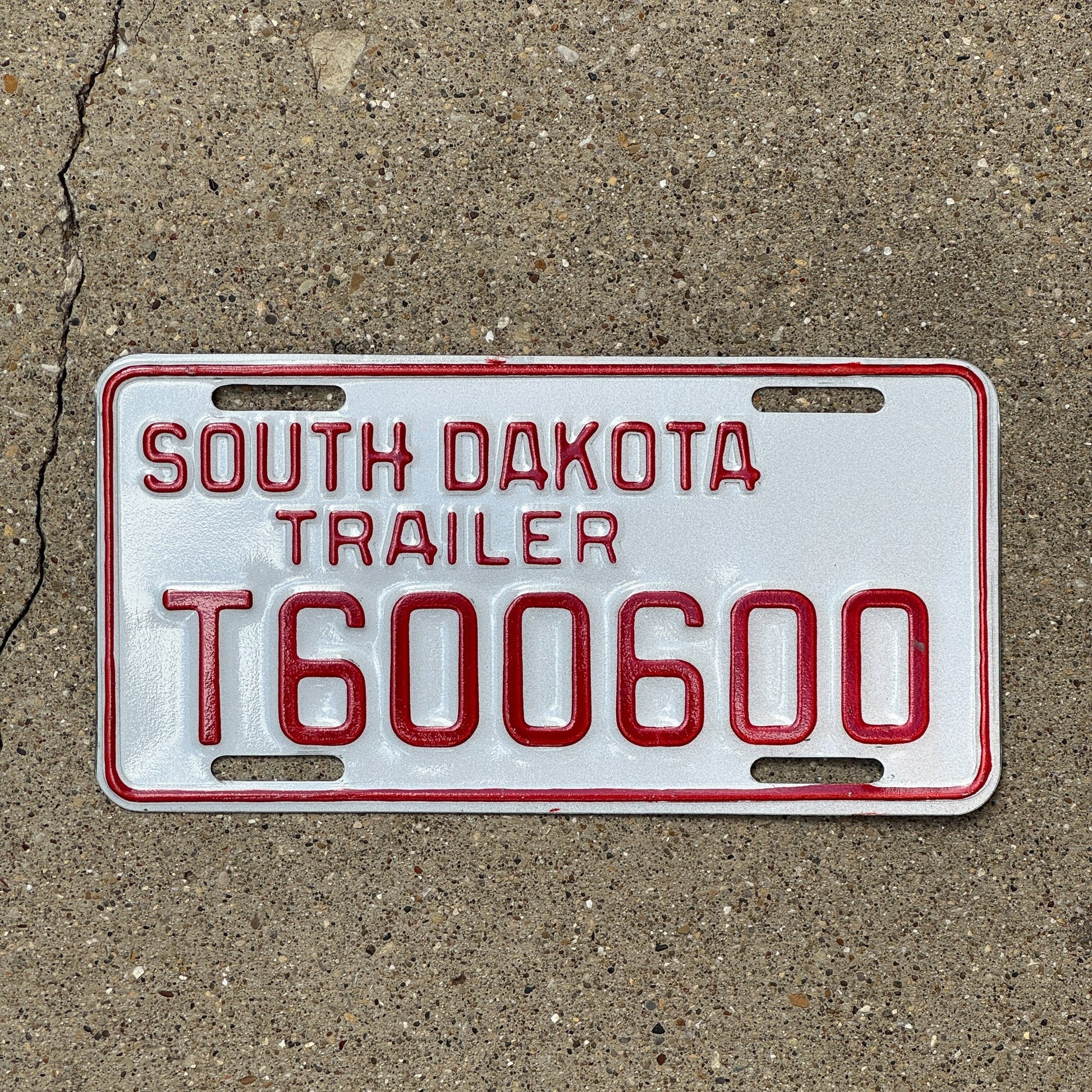 Photo of a 1997 South Dakota Trailer License Plate Auto Tag Garage Decor Vintage Repeat Repeating T 600 600