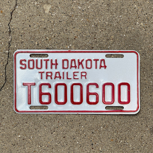 Photo of a 1997 South Dakota Trailer License Plate Auto Tag Garage Decor Vintage Repeat Repeating T 600 600