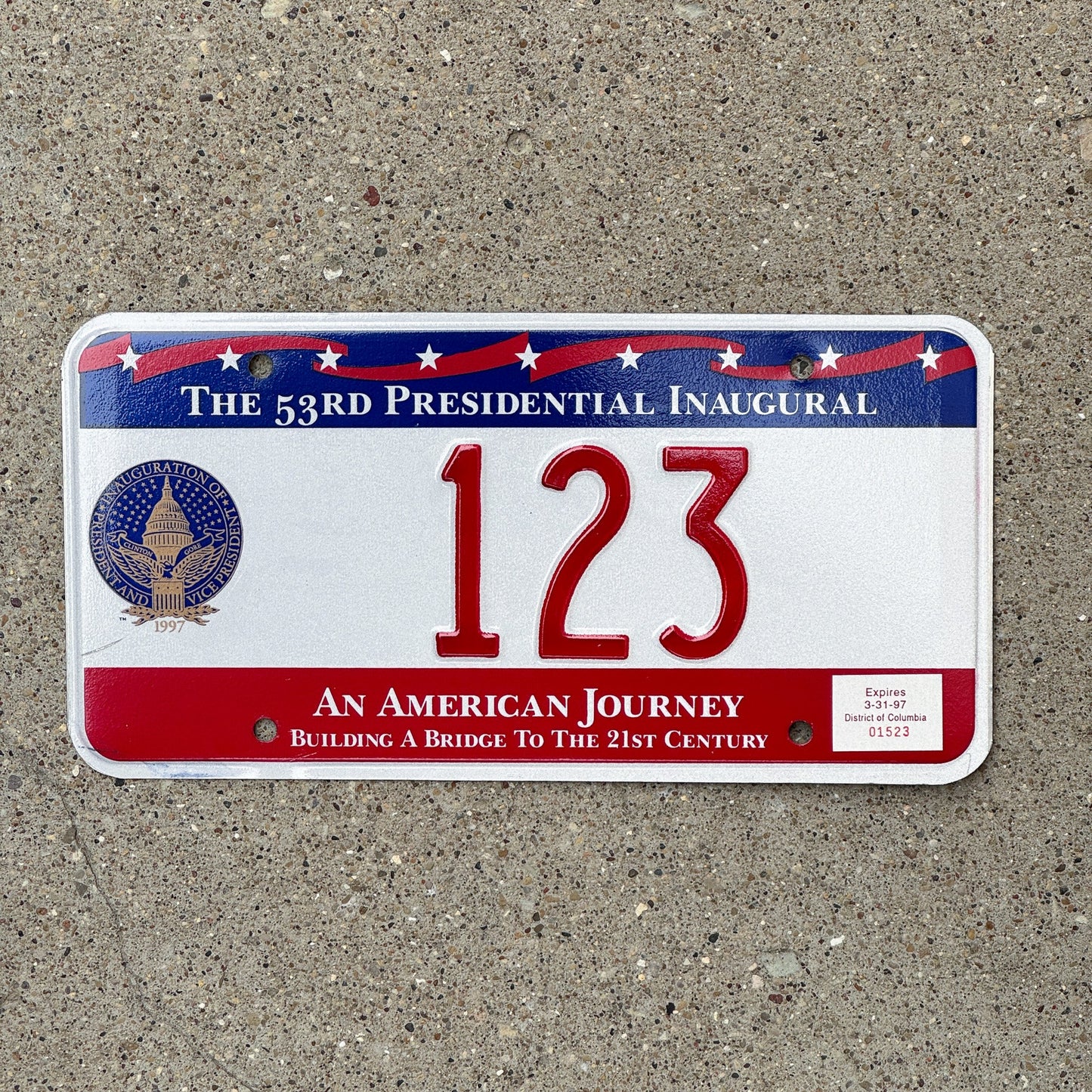 Photo of a 1997 Washington DC Inaugural License Plate Auto Tag Garage Decor Vintage Clinton Politics Political Low Number Three Digit Nice Number 123 with original patina