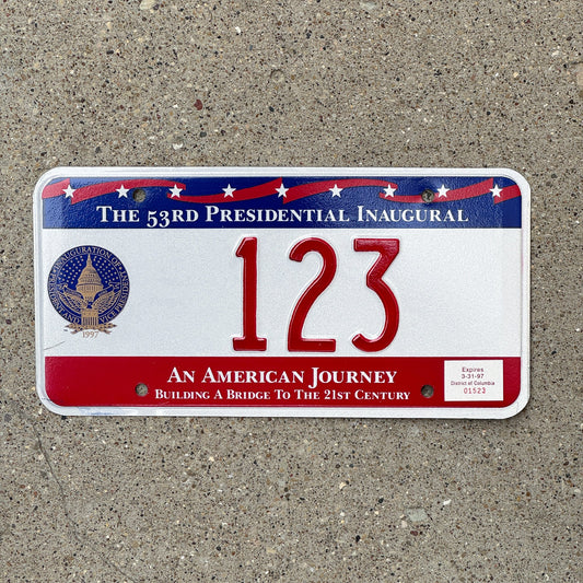 Photo of a 1997 Washington DC Inaugural License Plate Auto Tag Garage Decor Vintage Clinton Politics Political Low Number Three Digit Nice Number 123 with original patina