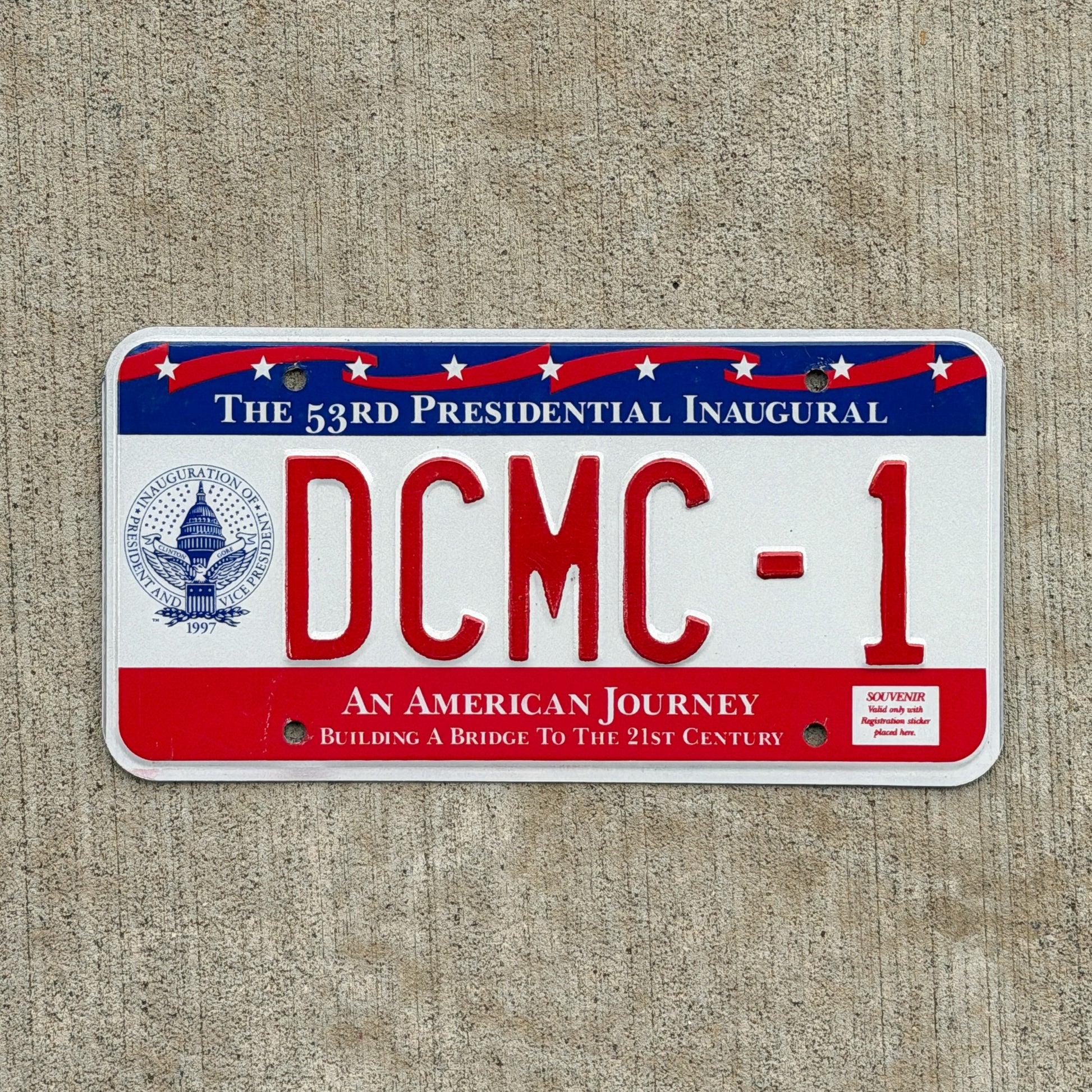 Photo of a 1997 Washington DC Inaugural Vanity License Plate Auto Tag 1 Vintage Garage Clinton Inauguration Politics Political DCMC 1 with original patina