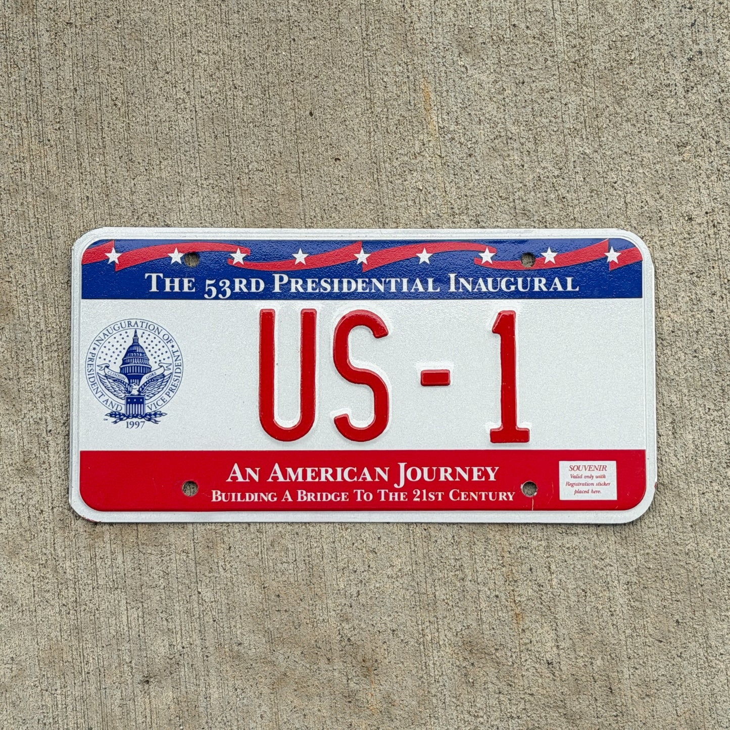 Photo of a 1997 Washington DC Inaugural Vanity License Plate Auto Tag 1 Vintage Garage Clinton Inauguration Politics Political US 1 with original patina