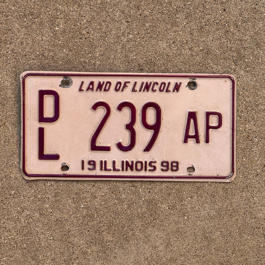 Photo of a 1998 1998 Illinois Dealer License Plate Auto Tag Garage Decor Vintage Pink DL 239 AP