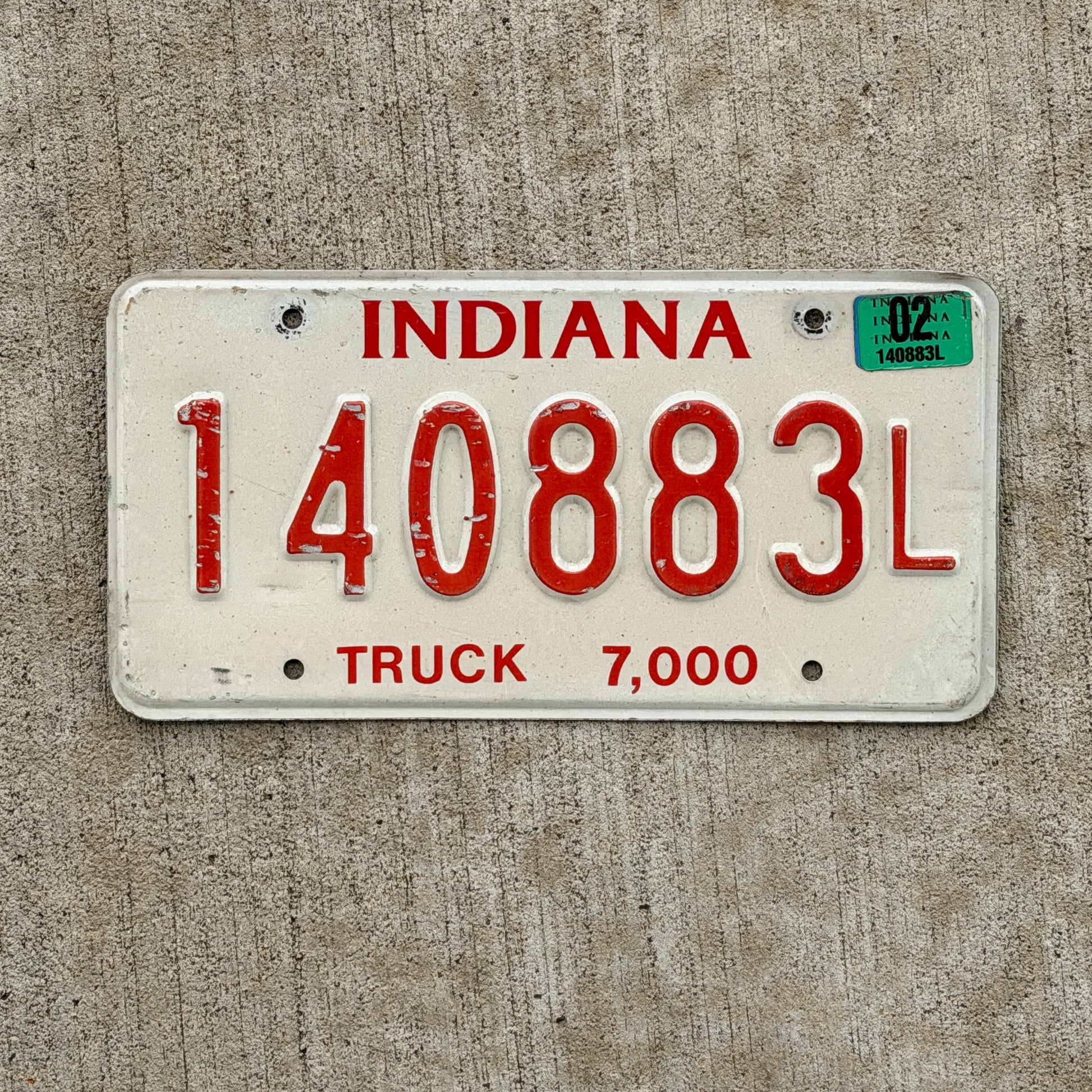 Photo of a 1998 2002 Indiana Truck License Plate Auto Tag Garage Decor Vintage 1 40883 L with original patina