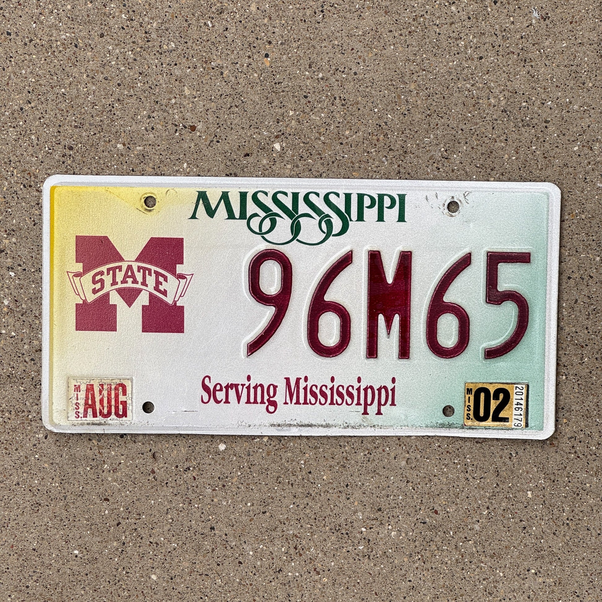 Photo of a 1998 2002 Mississippi Mississippi State License Plate Auto Tag Garage Decor Vintage University College 96 M 65
