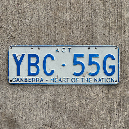 Photo of a 1998 Australian Capital Territory ACT License Plate Auto Tag Garage Decor Vintage Canberra Heart of the Nation YBC 55G with original patina