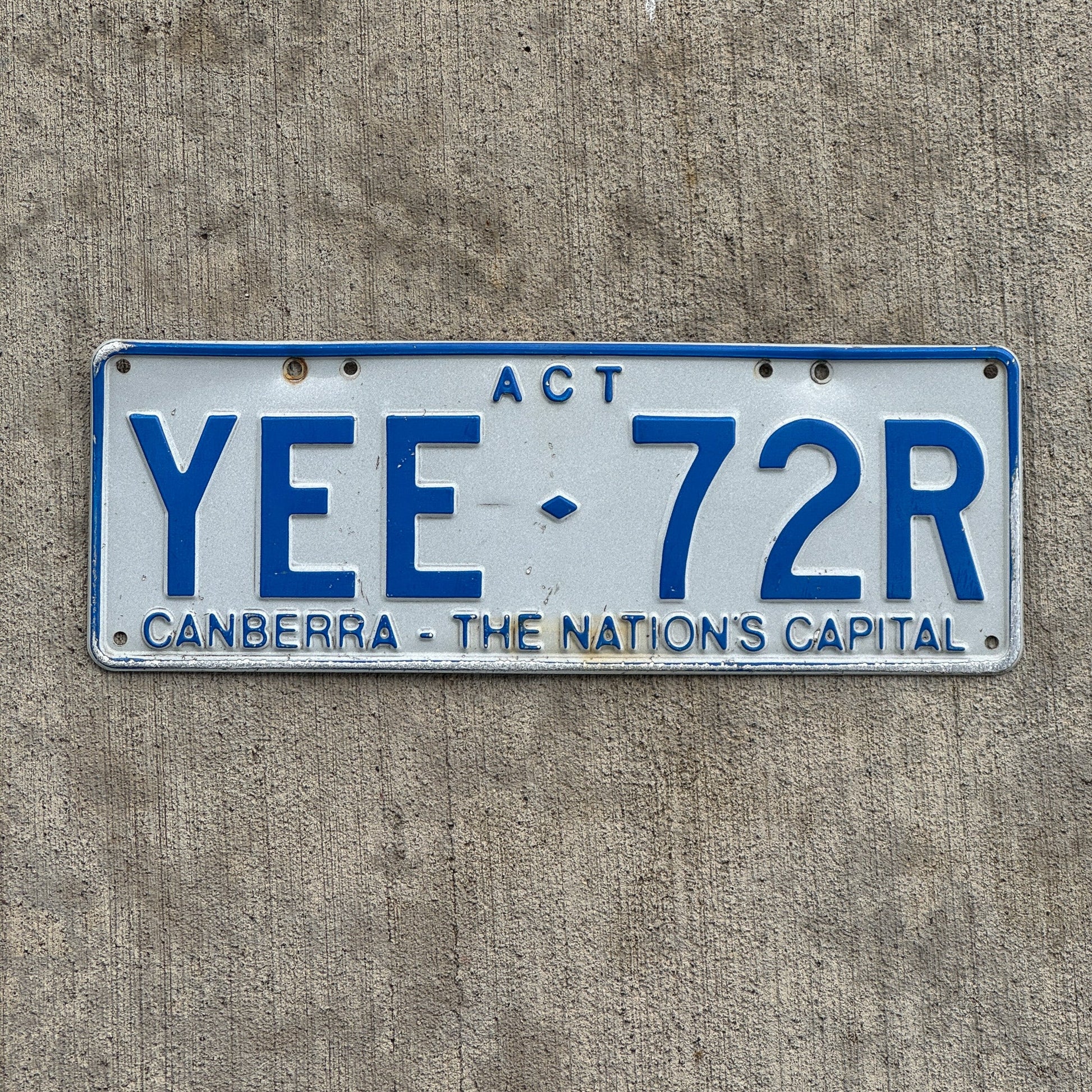 Photo of a 1998 Australian Capital Territory ACT License Plate Auto Tag Garage Decor Vintage Canberra Nation's Capital YEE 72R with original patina