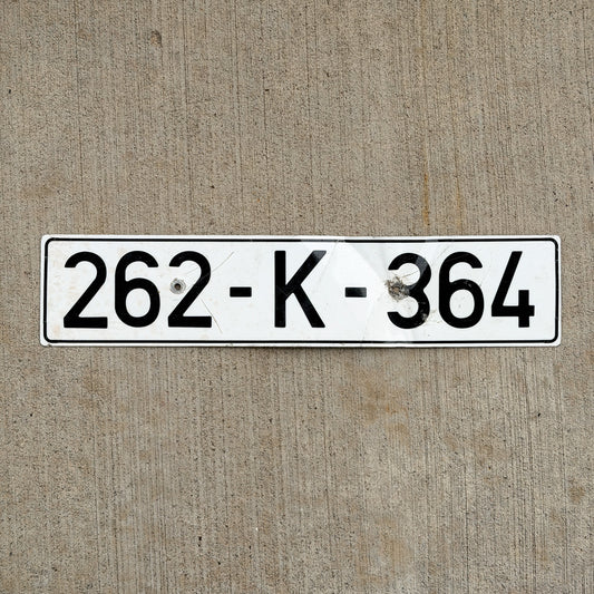 Photo of a 1998 Bosnia and Herzegovina Temporary License Plate Auto Tag Garage Decor Vintage 262 K 364 with original patina