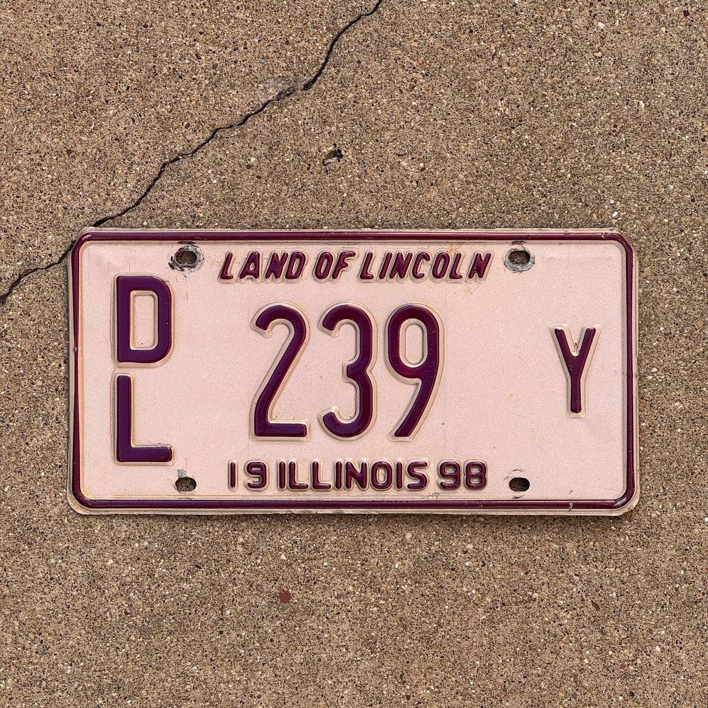 Photo of a 1998 Illinois Dealer License Plate Auto Tag Garage Decor Vintage Pink DL 239 Y