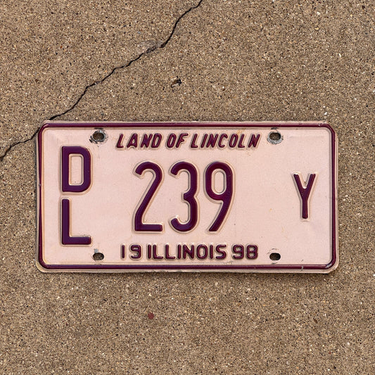 Photo of a 1998 Illinois Dealer License Plate Auto Tag Garage Decor Vintage Pink DL 239 Y