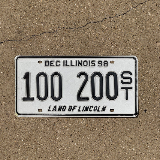 Photo of a 1998 Illinois Semi Trailer License Plate Auto Tag Garage Decor Vintage Fun Number 100 200 ST