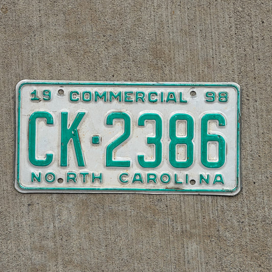Photo of a 1998 North Carolina Commercial License Plate Auto Tag Garage Decor Vintage CK 2386 with original patina