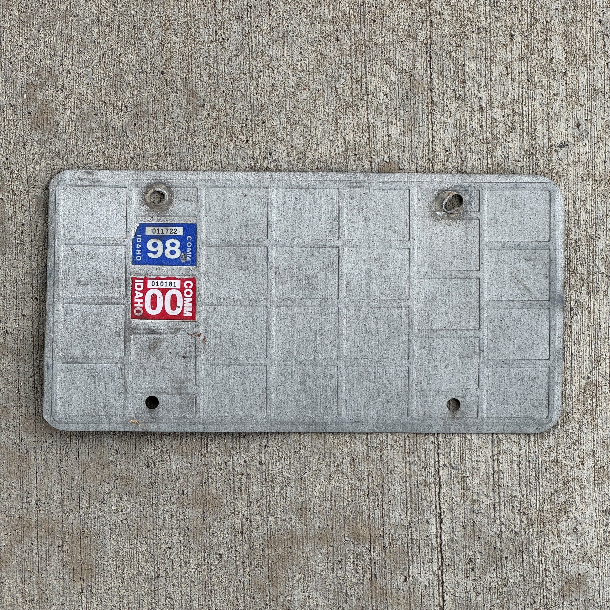 Photo of a 1998 Washington Reciprocity Prorate Bingo Sticker License Plate Auto Tag Garage Decor Vintage Idaho Stickers with original patina
