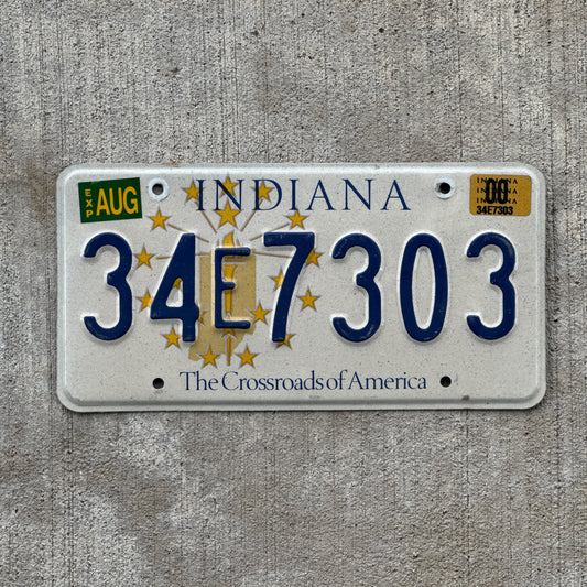 Photo of a 1999 2000 Indiana License Plate Auto Tag Garage Decor Vintage 34 E 7303 with original patina