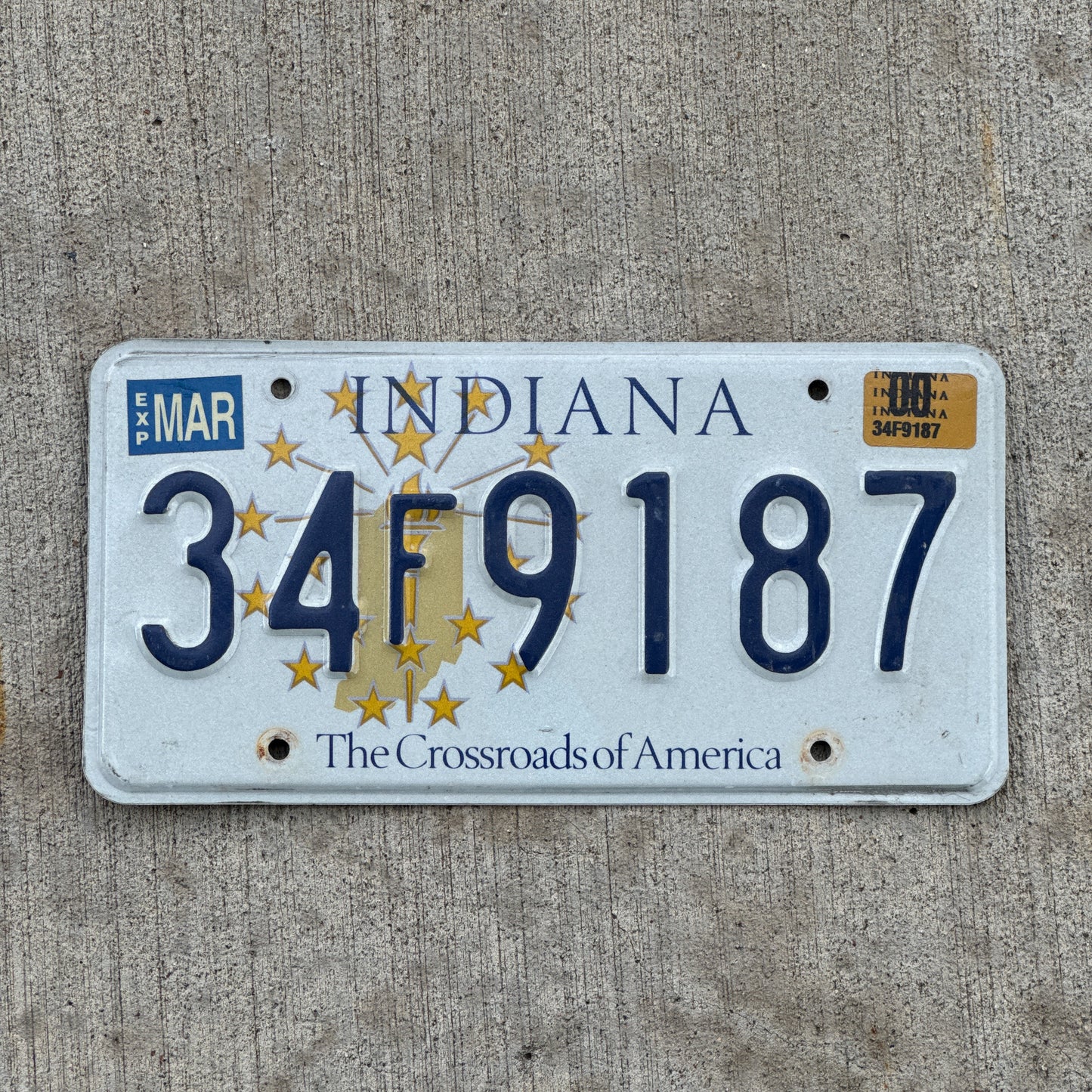 Photo of a 1999 2000 Indiana License Plate Auto Tag Garage Decor Vintage 34 F 9187 with original patina