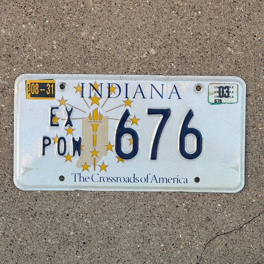 Photo of a 1999 2003 Indiana Ex Prisoner of War License Plate Auto Tag Garage Decor Vintage POW 676 with original patina