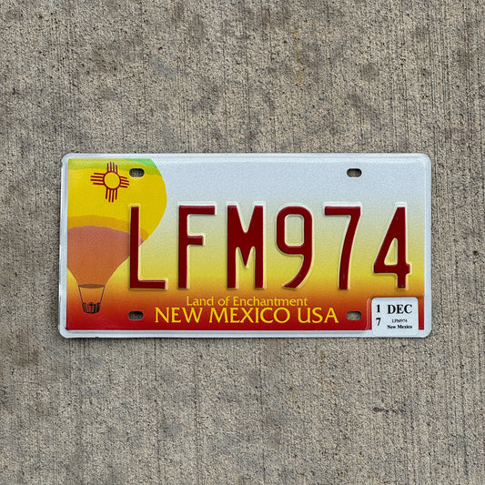 Photo of a 1999 2017 New Mexico License Plate Auto Tag Garage Decor Vintage Hot Air Balloon LFM 974 with original patina
