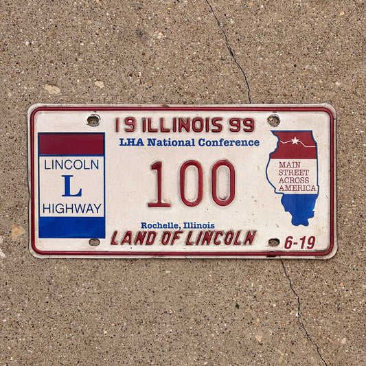 Photo of a 1999 Illinois Event License Plate Auto Tag Garage Decor Vintage Lincoln Highway 100 with original patina
