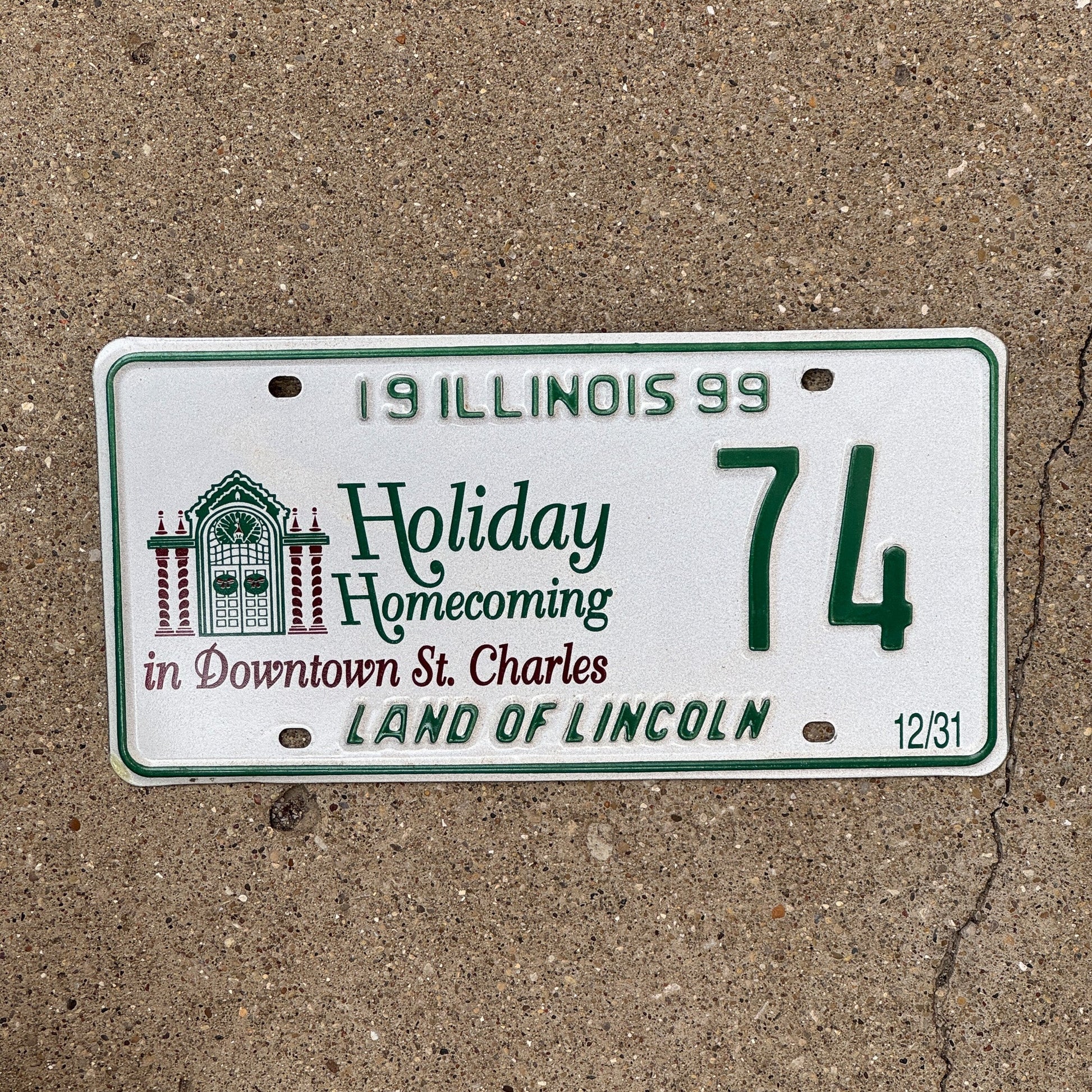 Photo of a 1999 Illinois EVENT License Plate Auto Tag Garage Decor Vintage St Charles Christmas 74