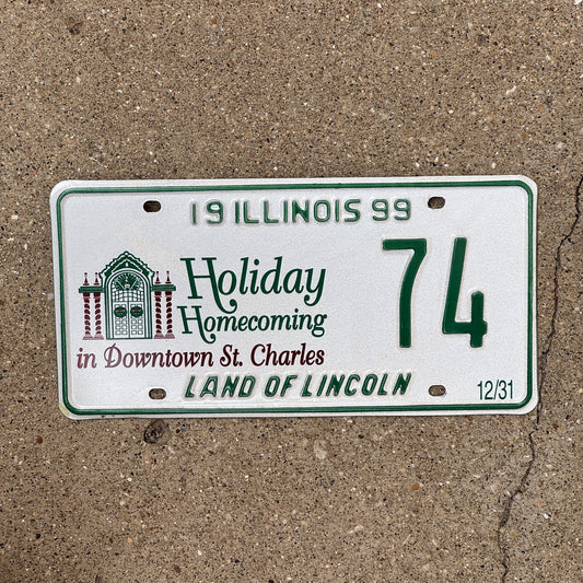 Photo of a 1999 Illinois EVENT License Plate Auto Tag Garage Decor Vintage St Charles Christmas 74