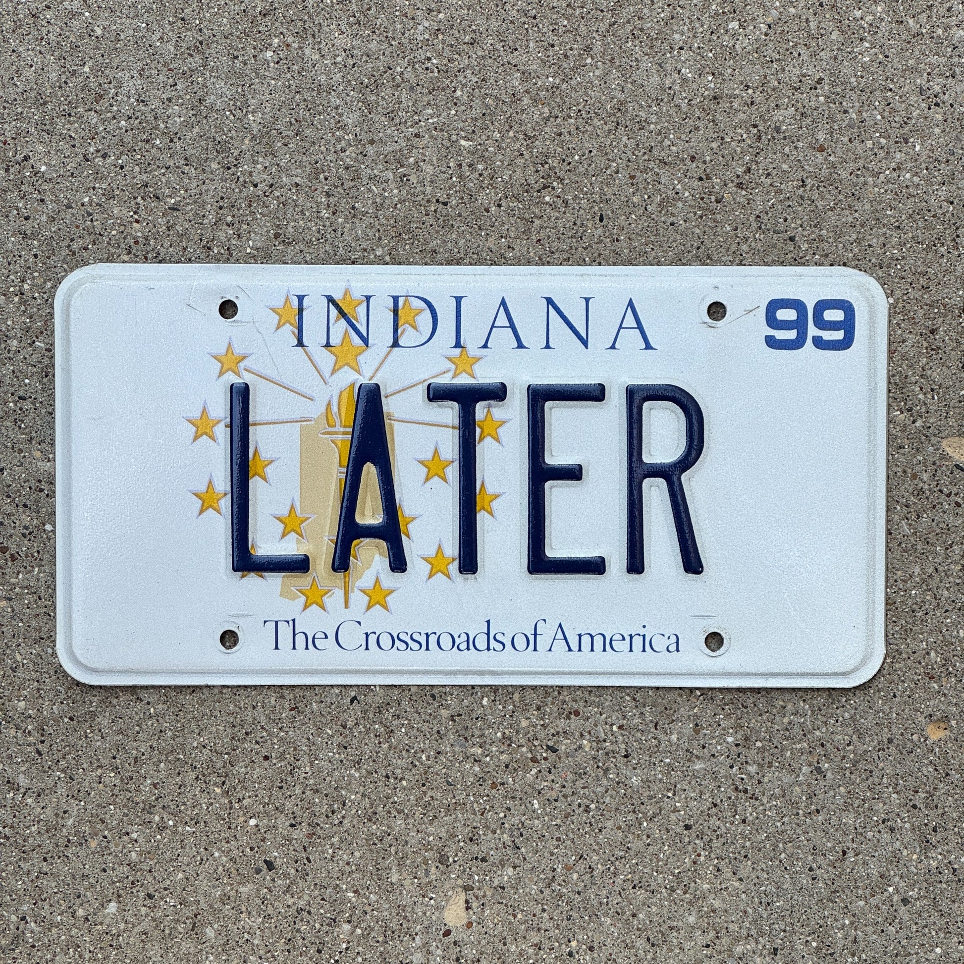 Photo of a 1999 Indiana Vanity License Plate Auto Tag Garage Decor Vintage Bye So Long LATER with original patina