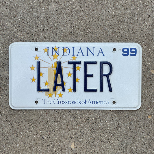 Photo of a 1999 Indiana Vanity License Plate Auto Tag Garage Decor Vintage Bye So Long LATER with original patina