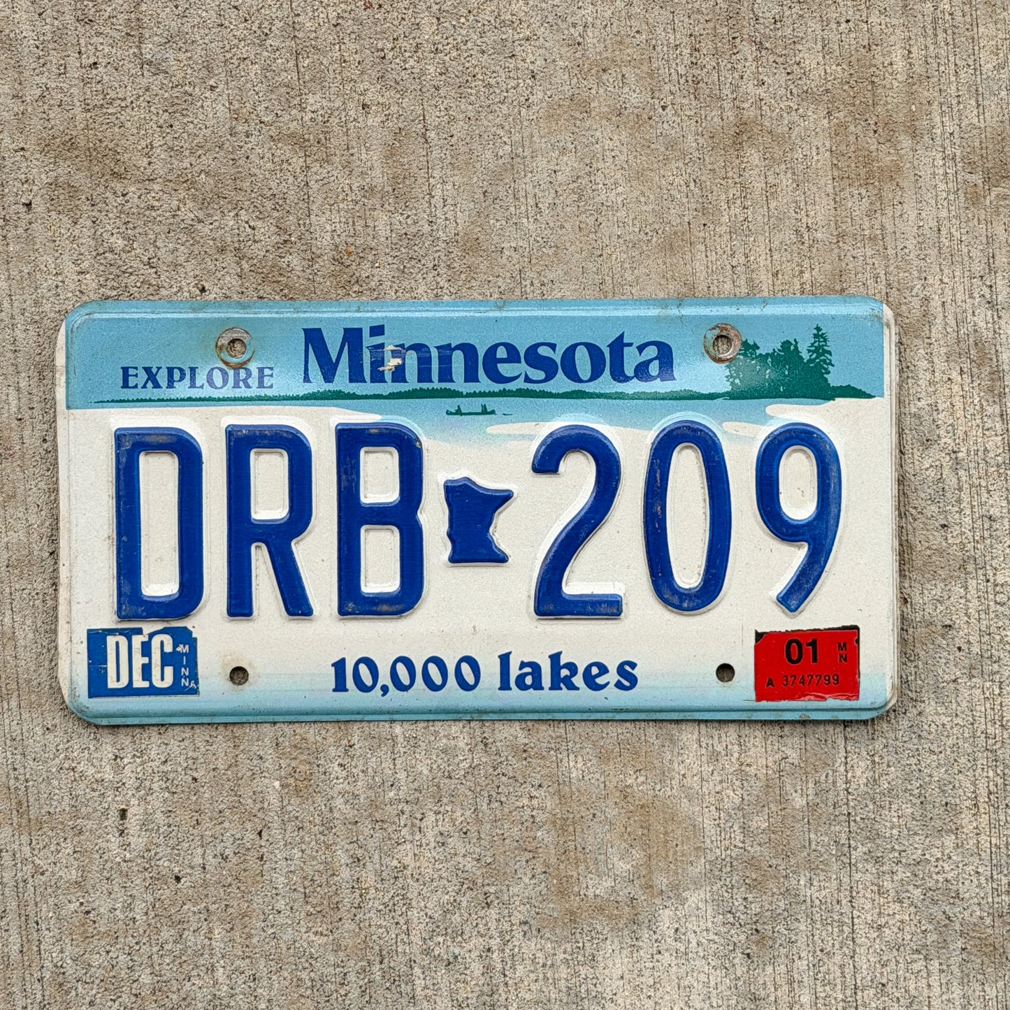 Photo of a 2000 2001 Minnesota License Plate Auto Tag Garage Decor Vintage DRB 209 with original patina