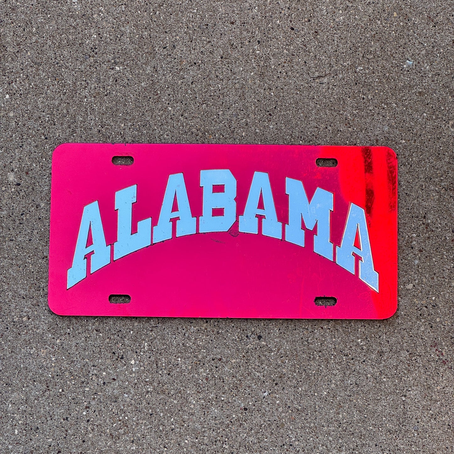Photo of a 2000 Era Alabama License Plate Booster License Plate Auto Tag Garage Decor Vintage Plastic University of Alabama with original patina