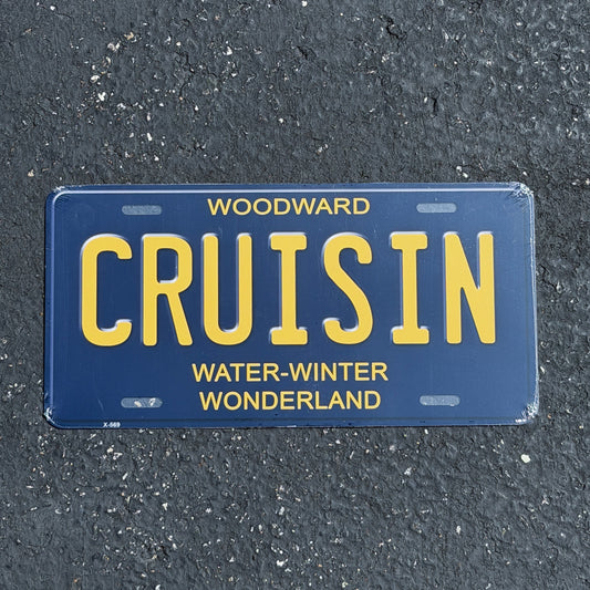 Photo of a 2000 Era CRUISIN Michigan Booster License Plate Auto Tag Garage Decor Vintage
 Woodward Hotrod Classic Car Metal with original patina