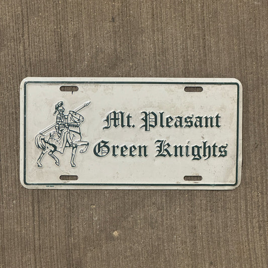 Photo of a 2000 Era Delaware License Plate Booster License Plate Auto Tag Garage Decor Vintage Metal High School Mt. Pleasant Green Knights with original patina