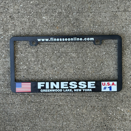 Photo of a 2000 Era Finesse Online Greenwood Lake USA #1 New York License Plate Frame Auto Tag Garage Decor Vintage
 Plastic with original patina