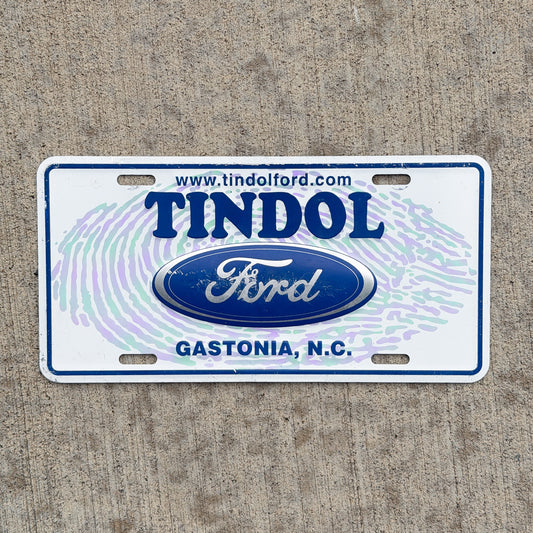 Photo of a 2000 Era Gastonia North Carolina Booster License Plate Auto Tag Garage Decor Vintage Tindol Ford Metal with original patina