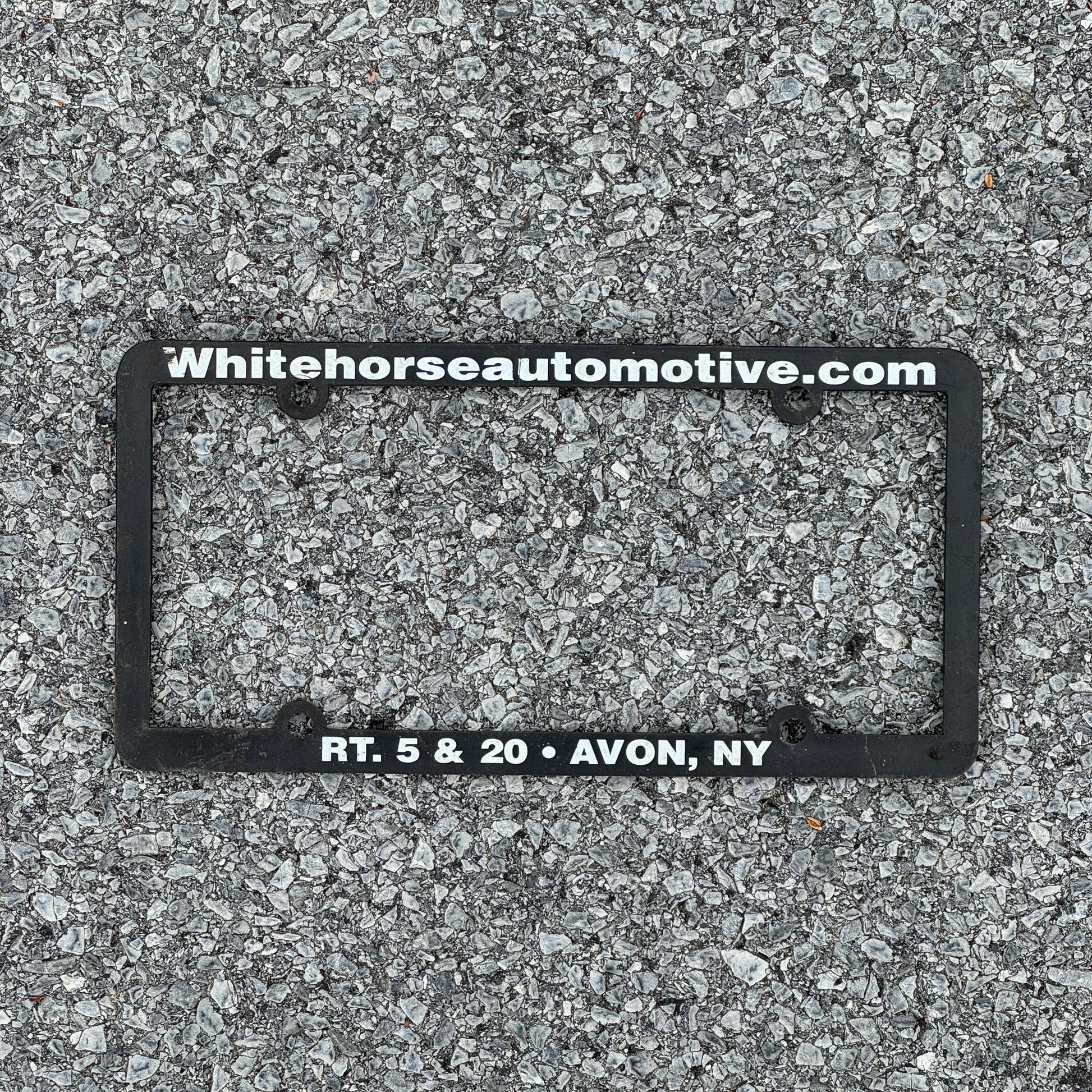 Photo of a 2000 Era New York License Plate Auto Tag Garage Decor Vintage Plastic White Horse Automotive License Plate Frame