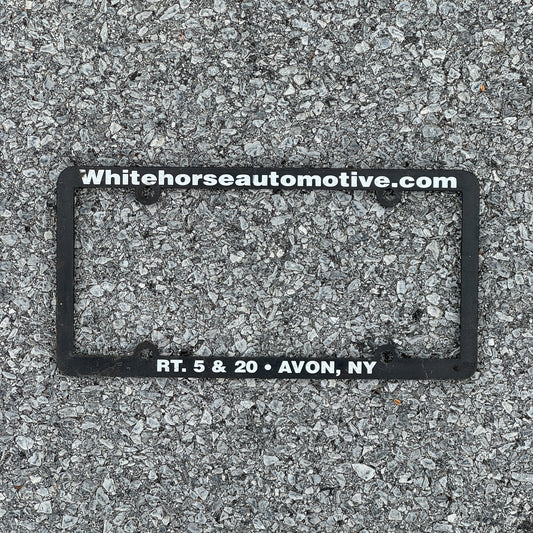 Photo of a 2000 Era New York License Plate Auto Tag Garage Decor Vintage Plastic White Horse Automotive License Plate Frame