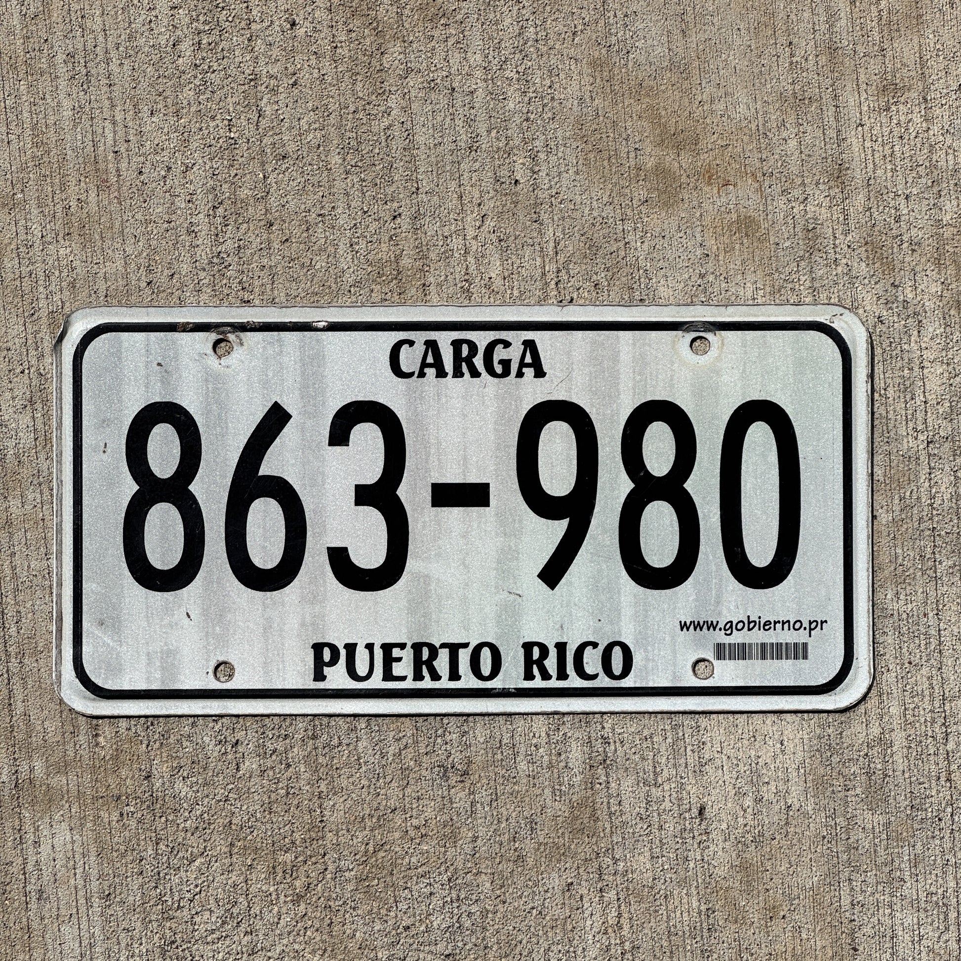 Photo of a 2000 Era Puerto Rico Carga License Plate Auto Tag Garage Decor Vintage Truck 863 980 with original patina